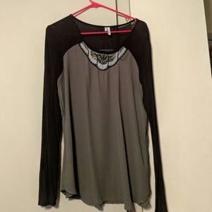 Green and black long sleeve embellished neckline